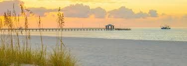Gulfport Mississippi beach pier at sunset