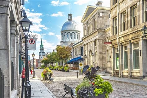 Old Montreal cobblestone street and Bonsecours Market