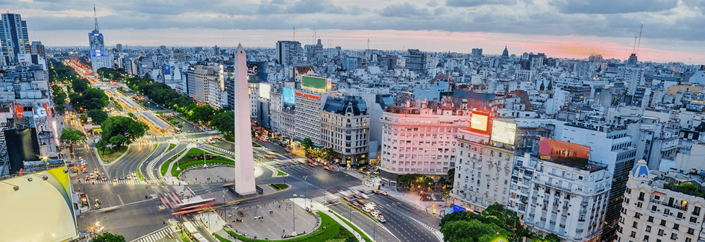 Buenos Aires obelisk and city skyline at dusk